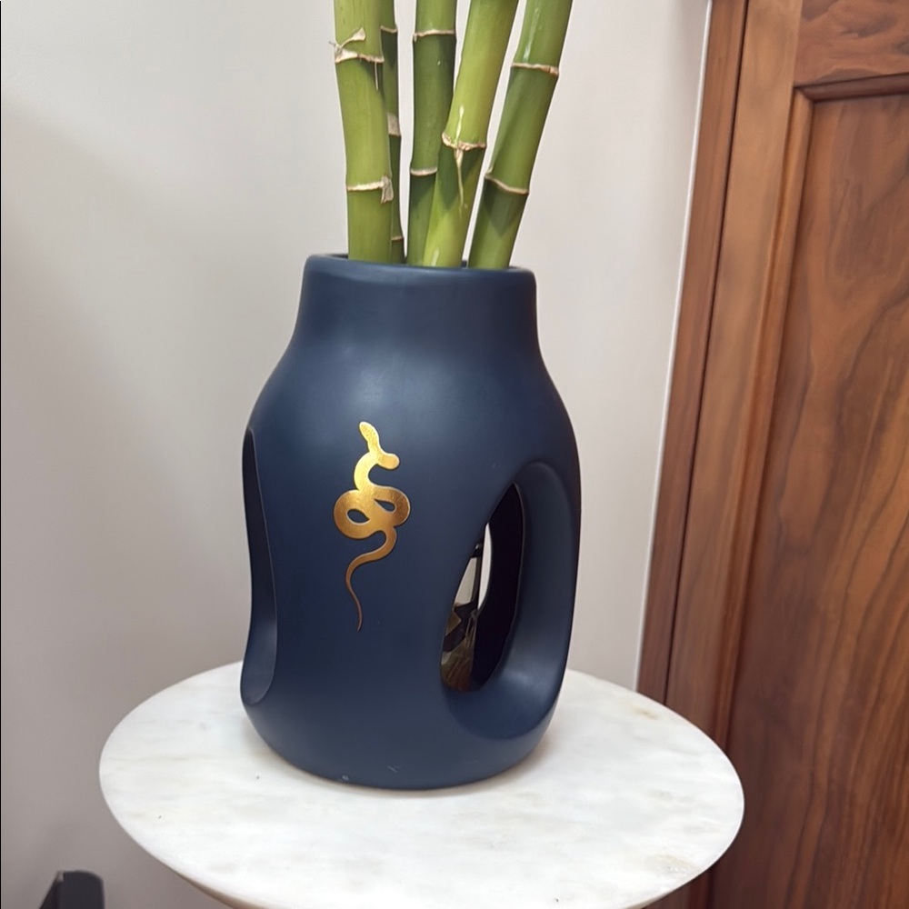 Modern Black and Gold Vase with Unique Design
